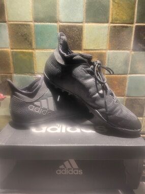 Adidas women’s  Black Turff or soccer Sneakers